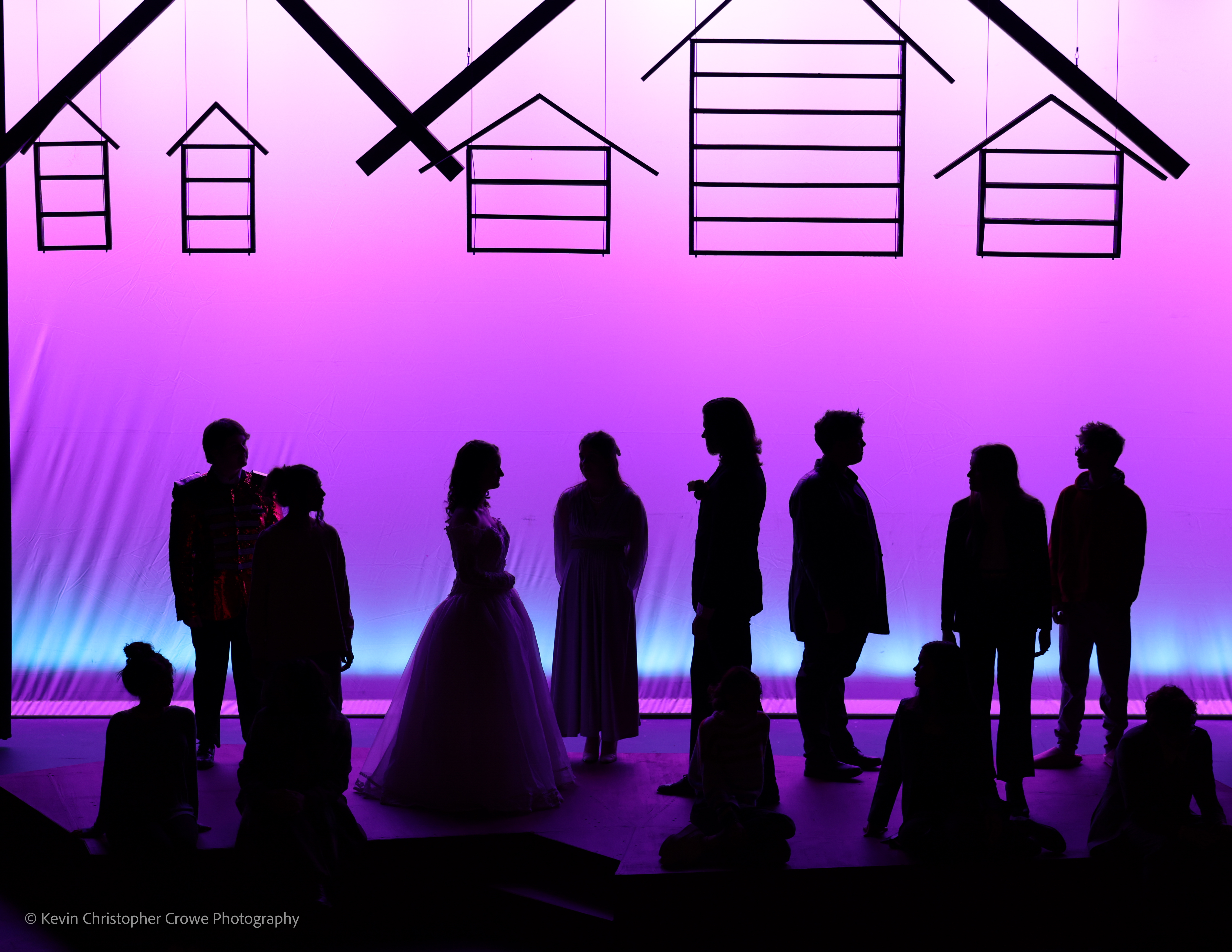 actors silhouettes, backlit by cyc lights